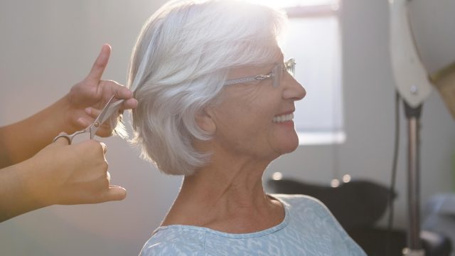 Senior getting a haircut